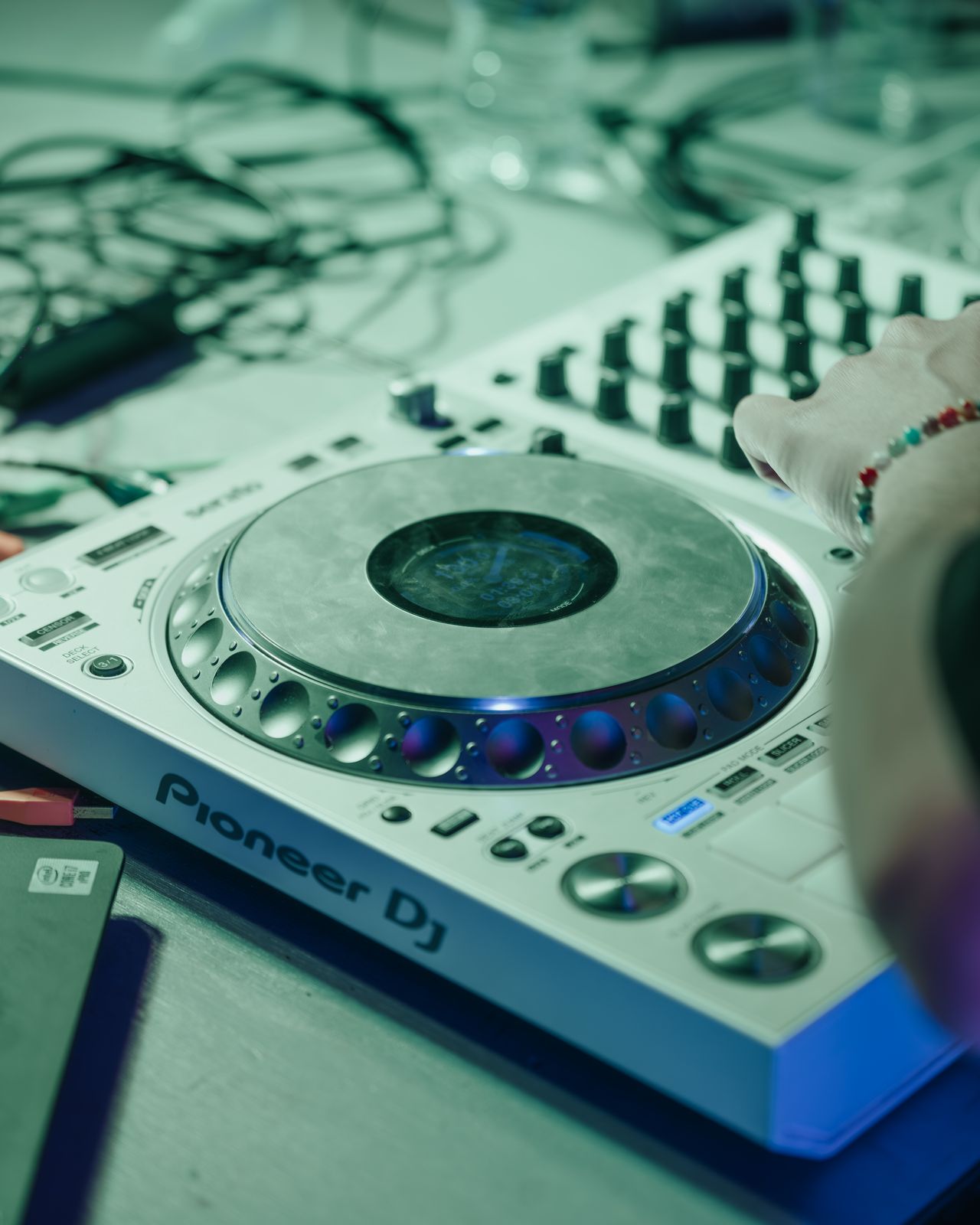 Close-up of a DJ controller and mixer on a club stage, Panama City Beach