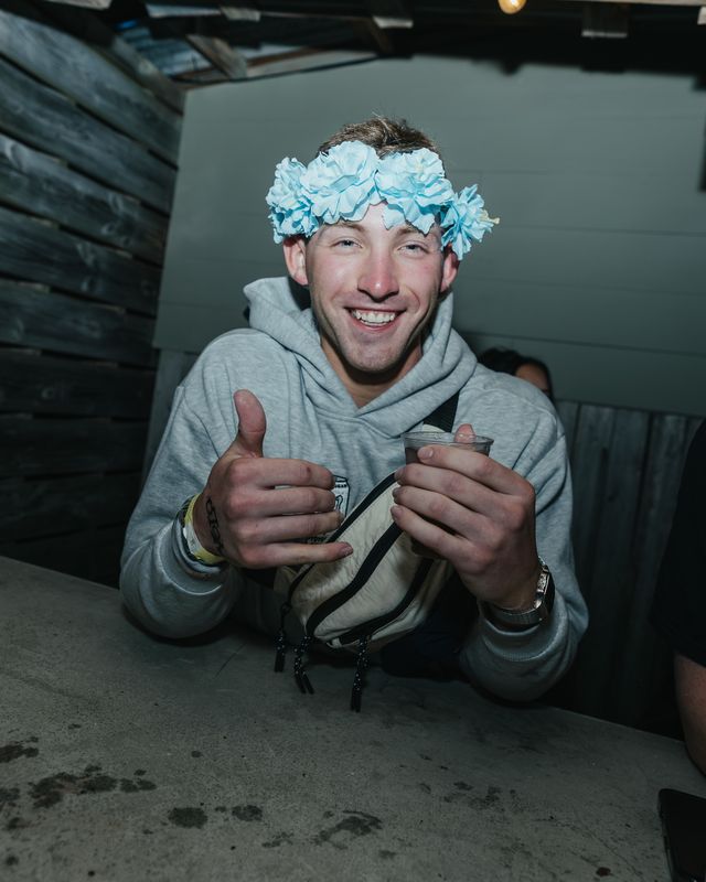 Guy Flower Crown Thumbs Up Guy in a flower crown and hoodie giving a thumbs up, Panama City Beach