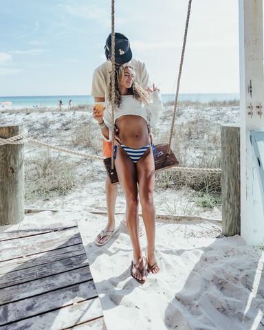 Couple Beach Swing Dunes - Senor Frog's Couple on a beach swing in front of dunes and sea oats, Senor Frog's, Panama City Beach