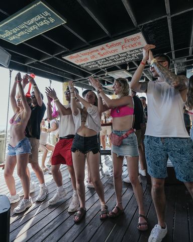 Friends Dancing Wooden Deck - Senor Frog's Friends dancing on a wooden beach-bar deck in the afternoon, Senor Frog's, Panama City Beach