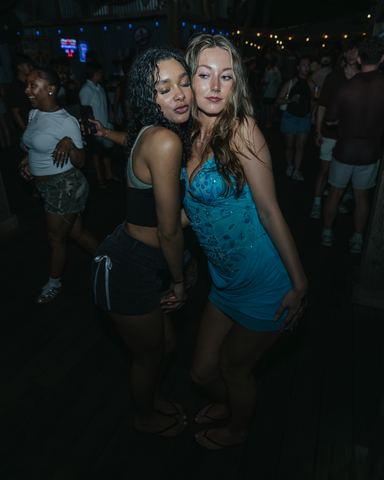 Two Women Dancing Close Two women dancing close together at a night party, Panama City Beach