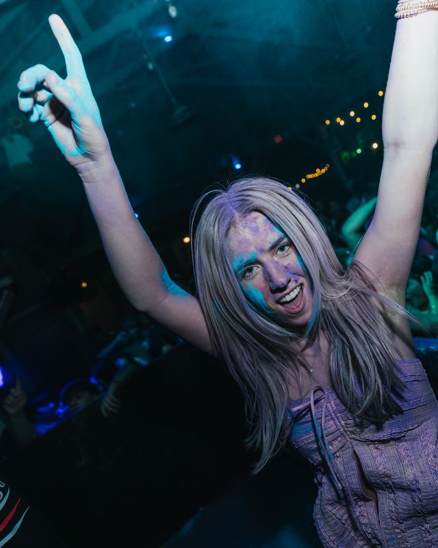 Woman Arms Up Blue Light Spring break week 4 at Panama City Beach, Mar 20 - 26, 2027